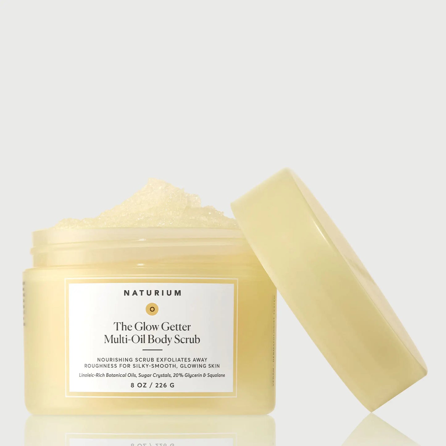 the-glow-getter-multi-oil-body-scrub-r5 NATR-40028-GlowGetter-Multi-Oil-Body-Scrub-Front-CapOff-bonebkgd.webp