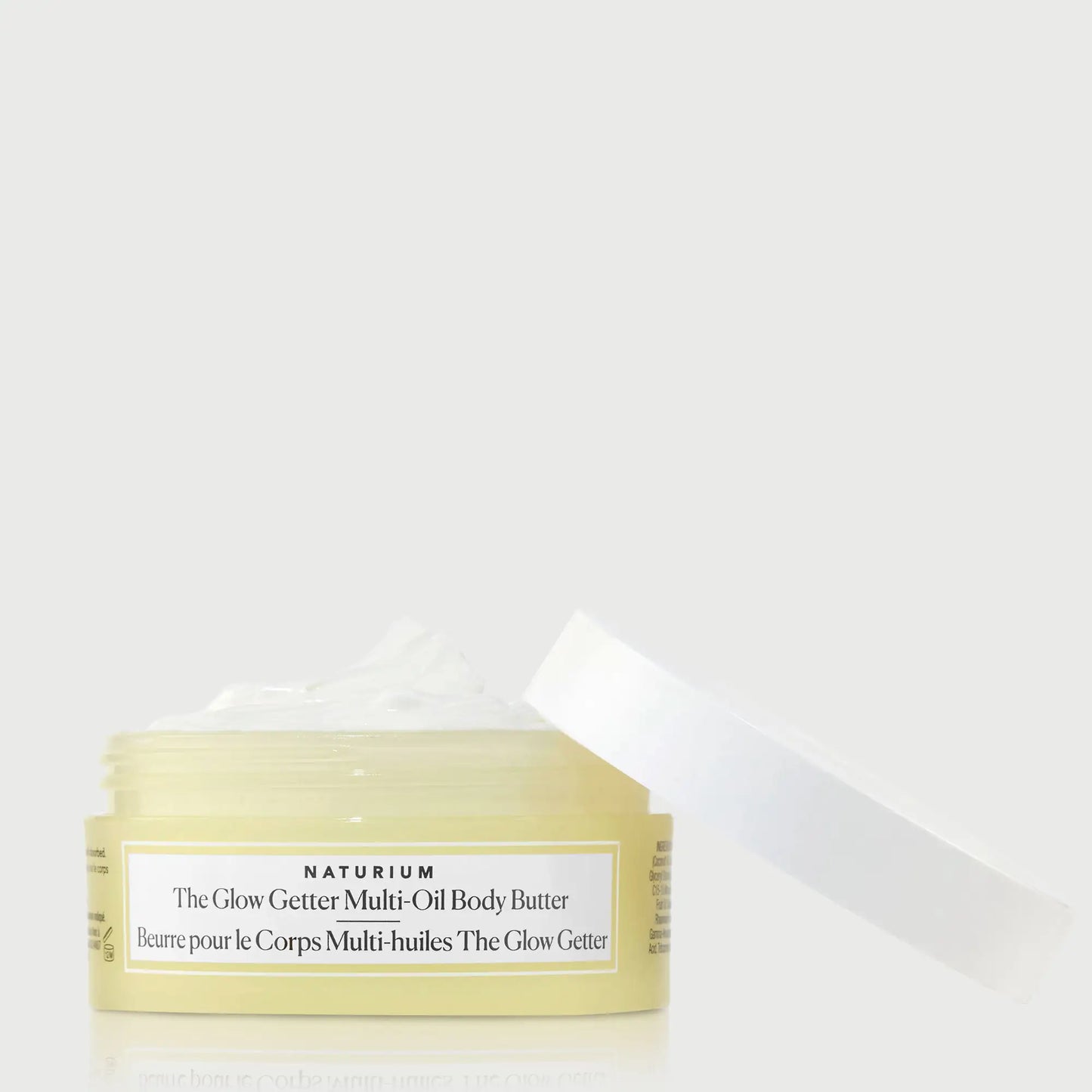the-glow-getter-multi-oil-body-butter-travel-size-c8 NATR-40115_Glow-Getter-Body-Butter-Mini_front_capoff_bonebkgd.webp